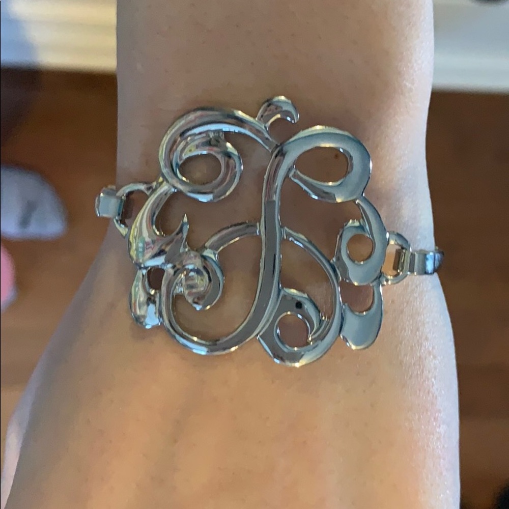 Never worn Silver “T” bangle